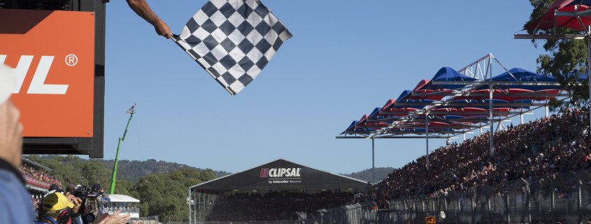 Car 22 taking the chequered flag at an action packed Clipsal 500 event.